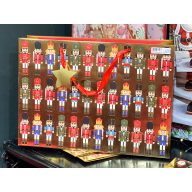 Diótörős, arany színű ajándéktasak, M-es, 31x26 cm